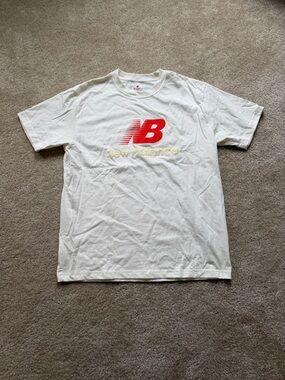 New Balance White Tee with Red/Orange Logo